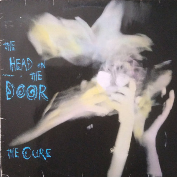 Cure the,      The Head on the Door